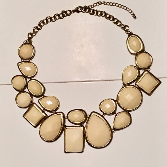 Awesome necklace with variety of beige shapes. - Picture 2 of 2